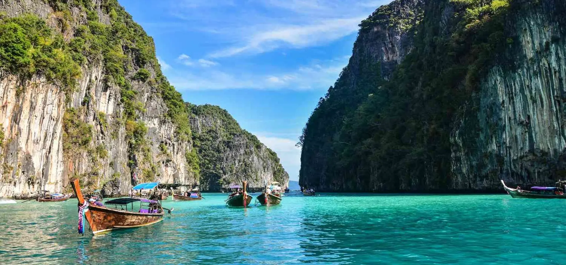 Longtail boats in a lagoon on Koh Phi Phi